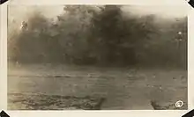 A high wave splashes ashore