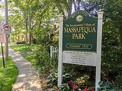 A welcome sign at an entrance to Massapequa Park in 2016.