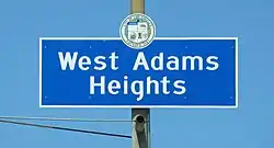 West Adams Heights signage located at the intersection of Western Avenue and the Santa Monica Freeway