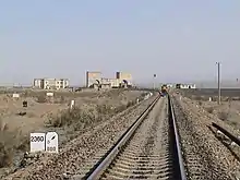 Westernmost point of the Northern Xinjiang railway, with marker showing 2,360&nbsp;km (1,470&nbsp;mi) from Lanzhou