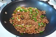 Wheat berries cooking - soaked then sauteed with spring onion