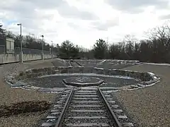 A former roundhouse uncovered during construction was turned into a small park