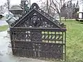 Elaborate cast and wrought iron garden gate.