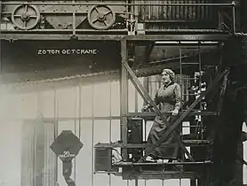 A woman operating a 20-ton[which?] OET crane, 1914