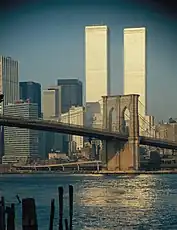World Trade Center exterior with Brooklyn Bridge in foreground. 1973