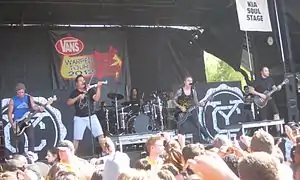 Left to right: Portman, Mackin, Parsons, Key, and Mendez performing on Warped Tour 2012