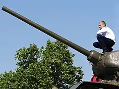 Young man on a Soviet-era tank in Tiraspol