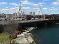 Construction of the Harborwalk, with the Charlestown Bridge and the Zakim Bridge