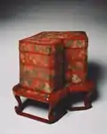 Japanese tiered food Box with stand; late 18th century; red lacquer over a wood core, with litharge painting and engraved gold designs; overall: 53 x 68&nbsp;cm; Cleveland Museum of Art