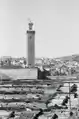Rooftop view of the Kissaria in 1932, with the minaret of the Zawiya of Moulay Idris II rising behind