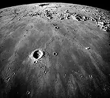 Southward looking oblique view of&nbsp;Mare Imbrium&nbsp;and&nbsp;Copernicus crater&nbsp;seen almost edge-on near the horizon with secondary elongated crater chains.&nbsp;