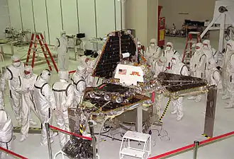 Pathfinder and Sojourner at JPL in October 1996, being 'folded' into its launch position.