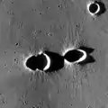 Photo taken by Lunar Reconnaissance Orbiter with low Sun, showing relief of ejecta.
