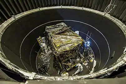 ISIM being prepared for a thermal vacuum test, 2013