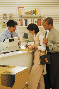 woman paying for an item in a store
