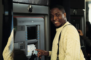 man at an ATM machine