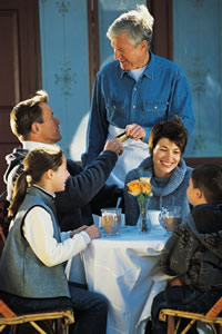 waiter delivering check at a resturant