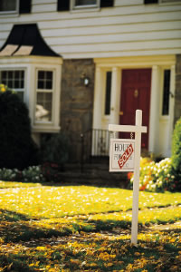 house with sold sign