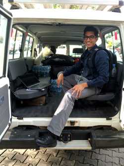 Neil Vora prepares for the two-and-half hour drive to Bomi County in Liberia.