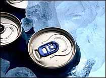 Photo of cold beverage cans in ice.