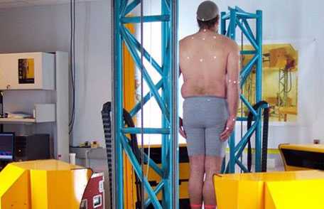 Truck driver in the full body scanning device to obtain the trucker’s body dimension information.