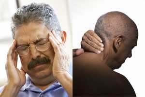 Man holding head.  Man holding neck.