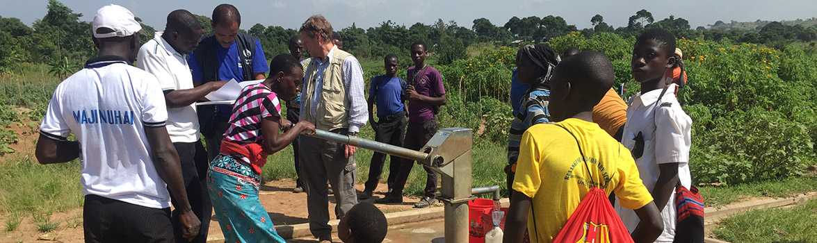 Disease detectives investigating the sources of water following a cholera outbreak in Tanzania.