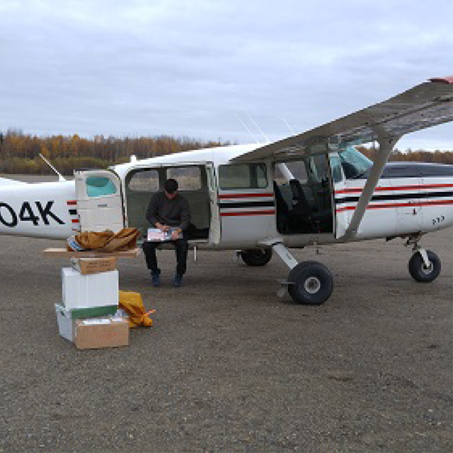 A small aircraft on the tarmac