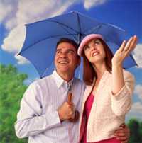 Man and woman under an umbrella