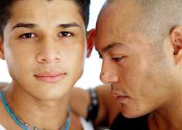 Close-up of MSM couple, one resting his head on the other's cheek