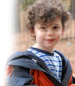 A young boy in a jacket