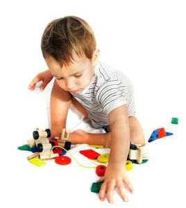 Photo: Child playing with toys