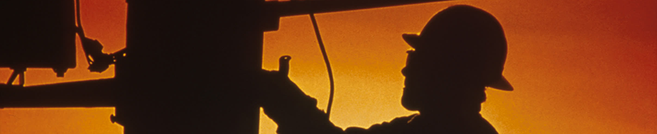 worker on electrical pole