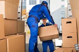 man lifting a large box