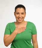 Woman with hand across chest