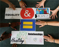 Diverse hands around piece of paper with the phrase equality and respect equal healthy relationships.